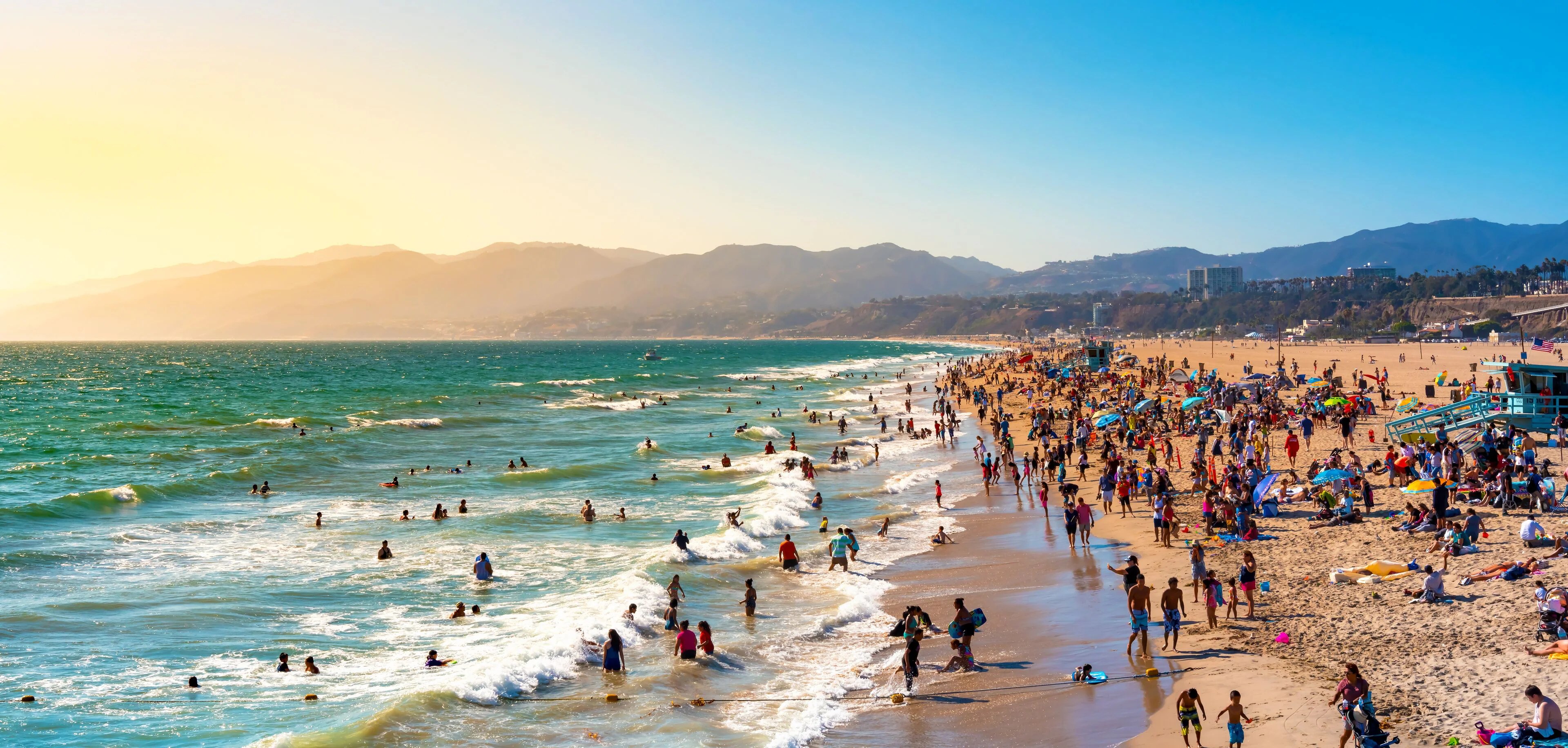 Beachgoers on a crowded Southern California beach