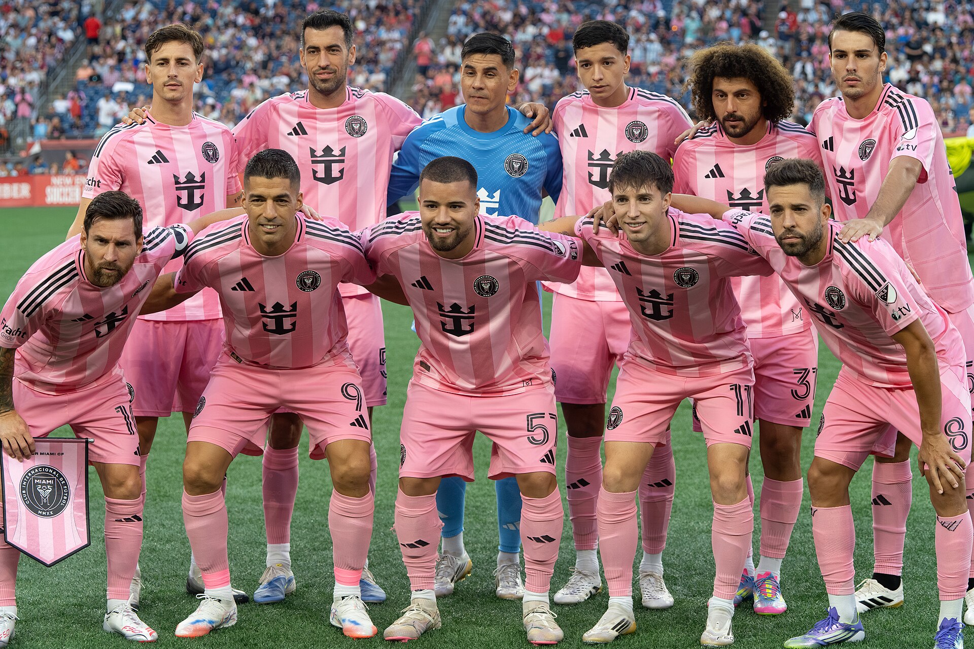 Inter Miami players line up before a match against New England