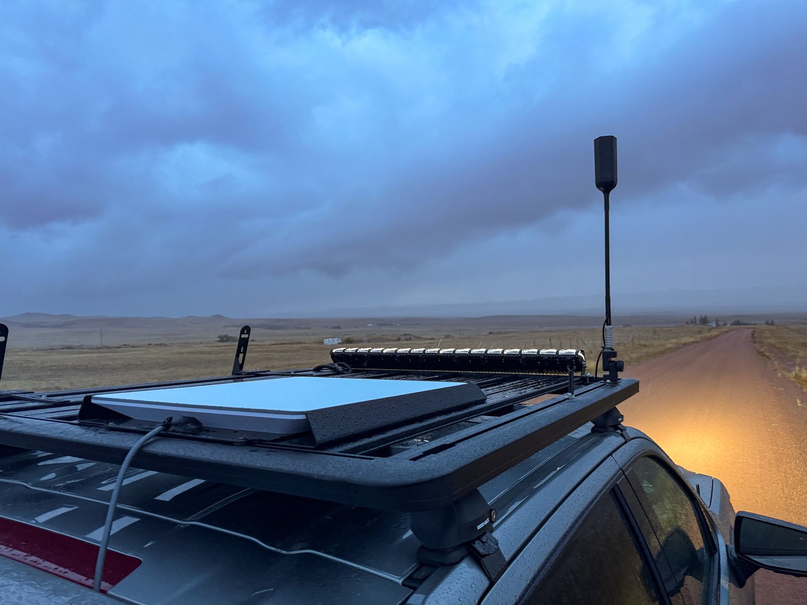 A Starlink flat-panel dish mounted on the roof of a truck — SpaceX is pairing its satellite constellation with terrestrial spectrum for Starlink Mobile