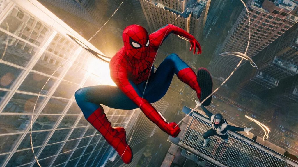 A film still of Spider-Man swinging between skyscrapers over New York City, promoting the record-breaking run of Spider-Man: Brand New Day
