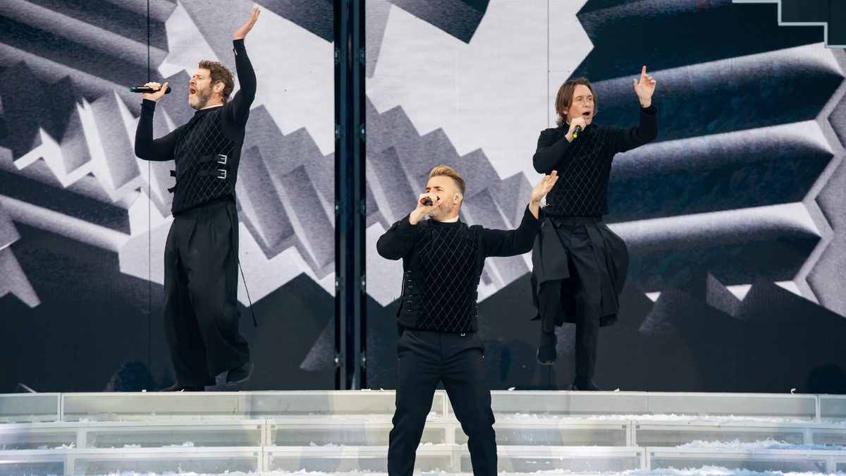 Take That performing on stage during the This Life tour.