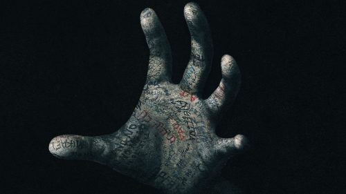 The embalmed hand from Talk to Me — the cursed object at the heart of the franchise's ritual