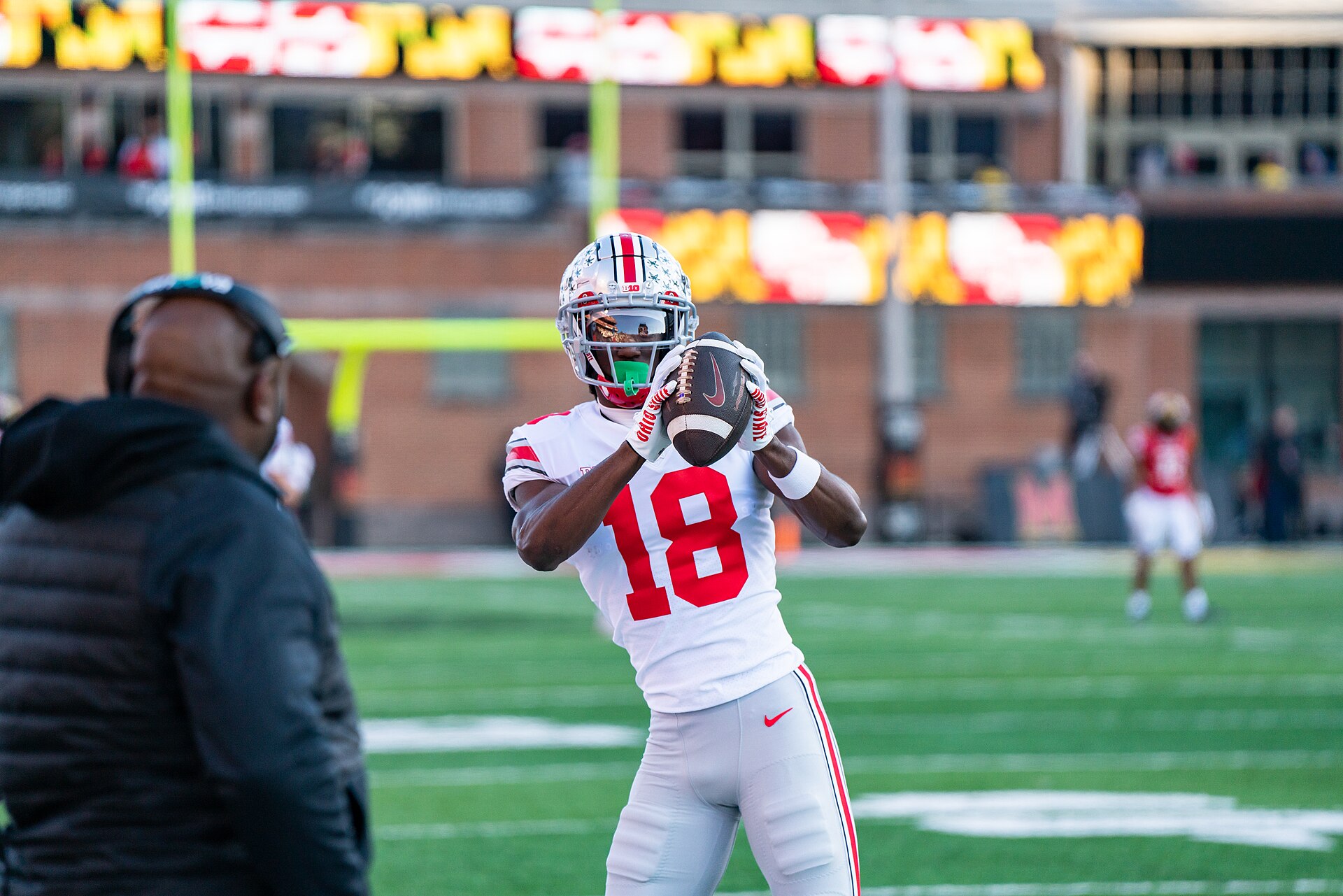 Marvin Harrison Jr. catching a pass during warmups at Ohio State