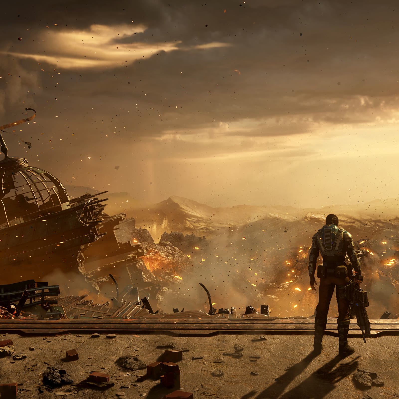 A COG soldier surveys the devastation of Emergence Day in Gears of War: E-Day