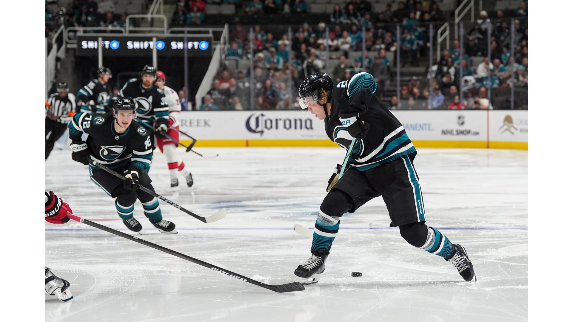 San Jose Sharks players in action at SAP Center during an NHL game (file photo)