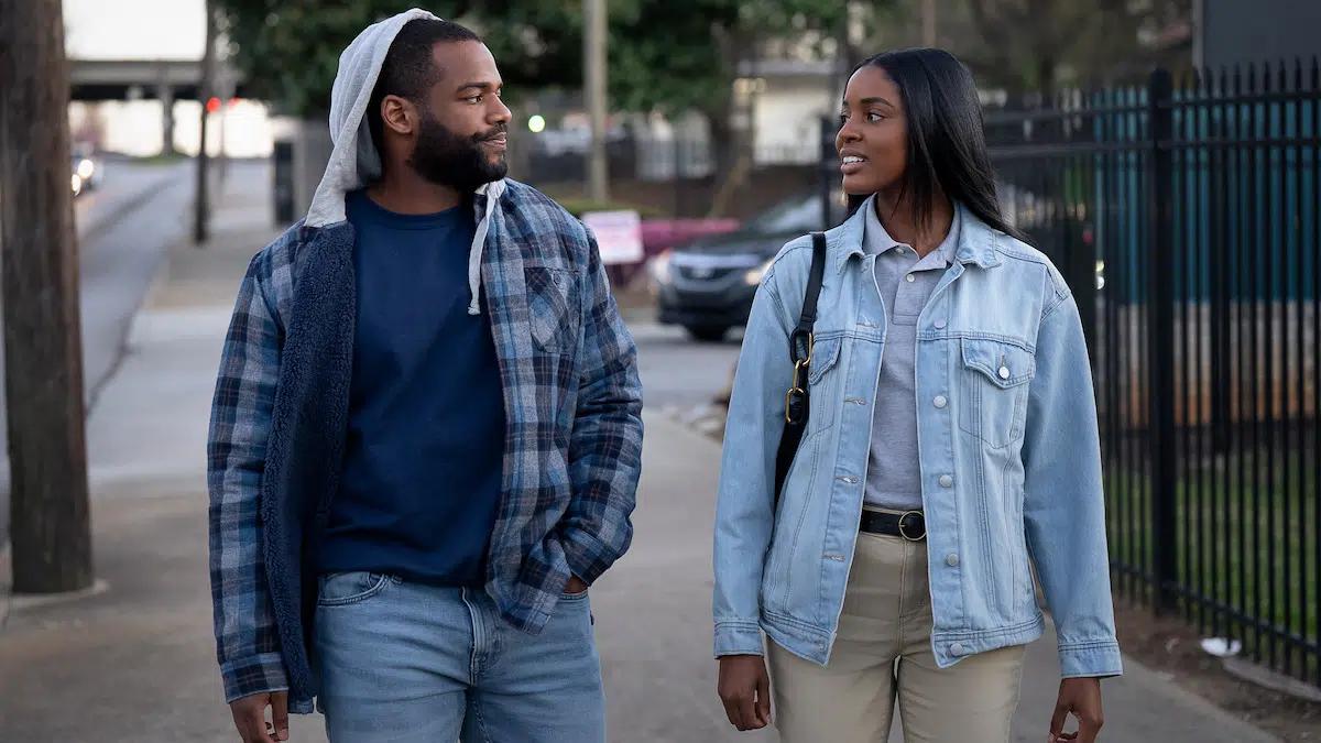 Naomi Baker and Jay Reeves walking together in a scene from Tyler Perry's Doing Life