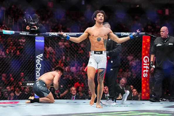Payton Talbott celebrates a knockout win in the UFC octagon