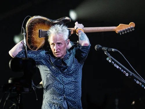 Pearl Jam guitarist Mike McCready performing on stage