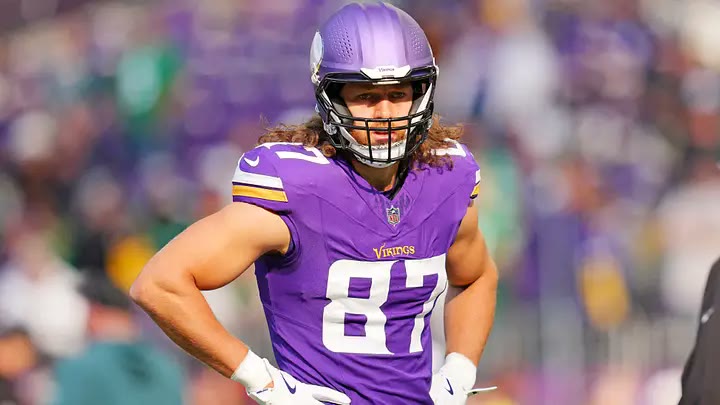 Minnesota Vikings tight end T.J. Hockenson making a catch against the Miami Dolphins at U.S. Bank Stadium