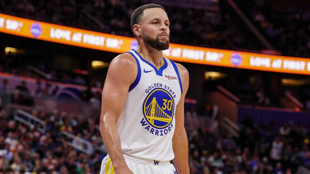 Stephen Curry in his Golden State Warriors uniform.
