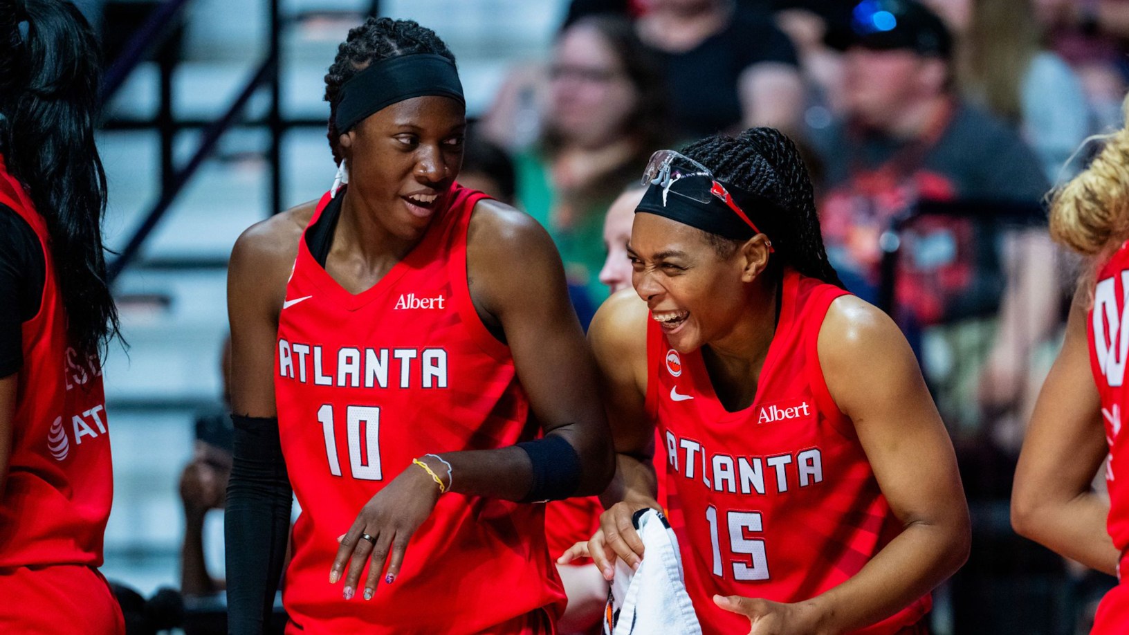 Atlanta Dream players celebrate during a 2026 WNBA game