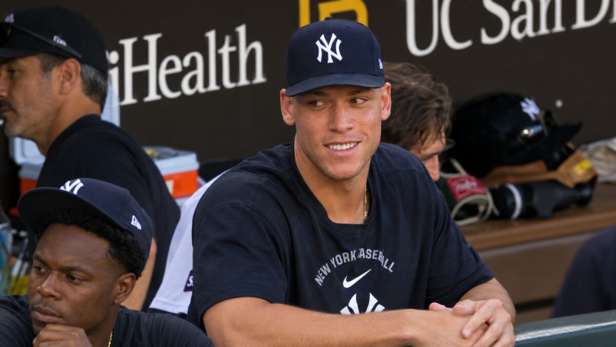 Aaron Judge in the Yankees dugout &mdash; out of the ALDS with a right calf strain