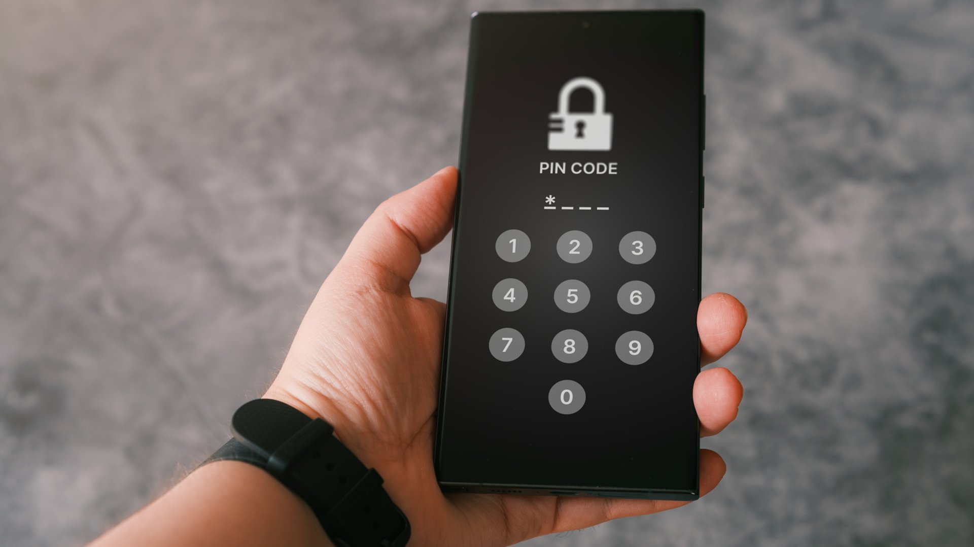 A hand holding a phone showing a PIN lock screen — device-level security without a website password, the way Previously signs you in