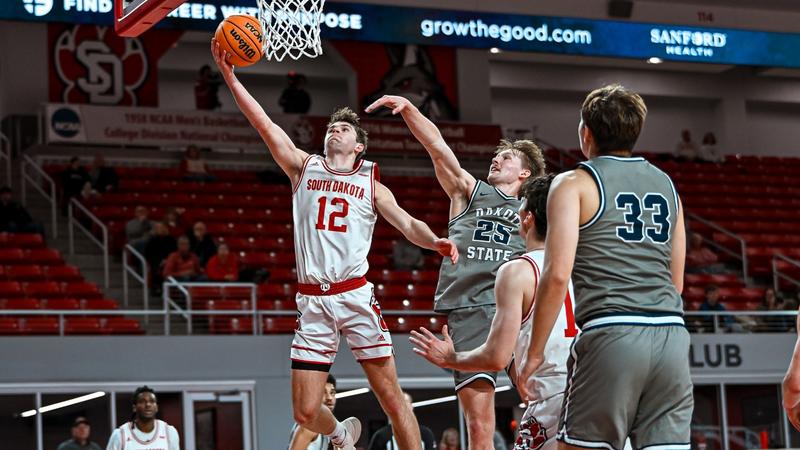 South Dakota Coyotes men's basketball in action at the Sanford Coyote Sports Center