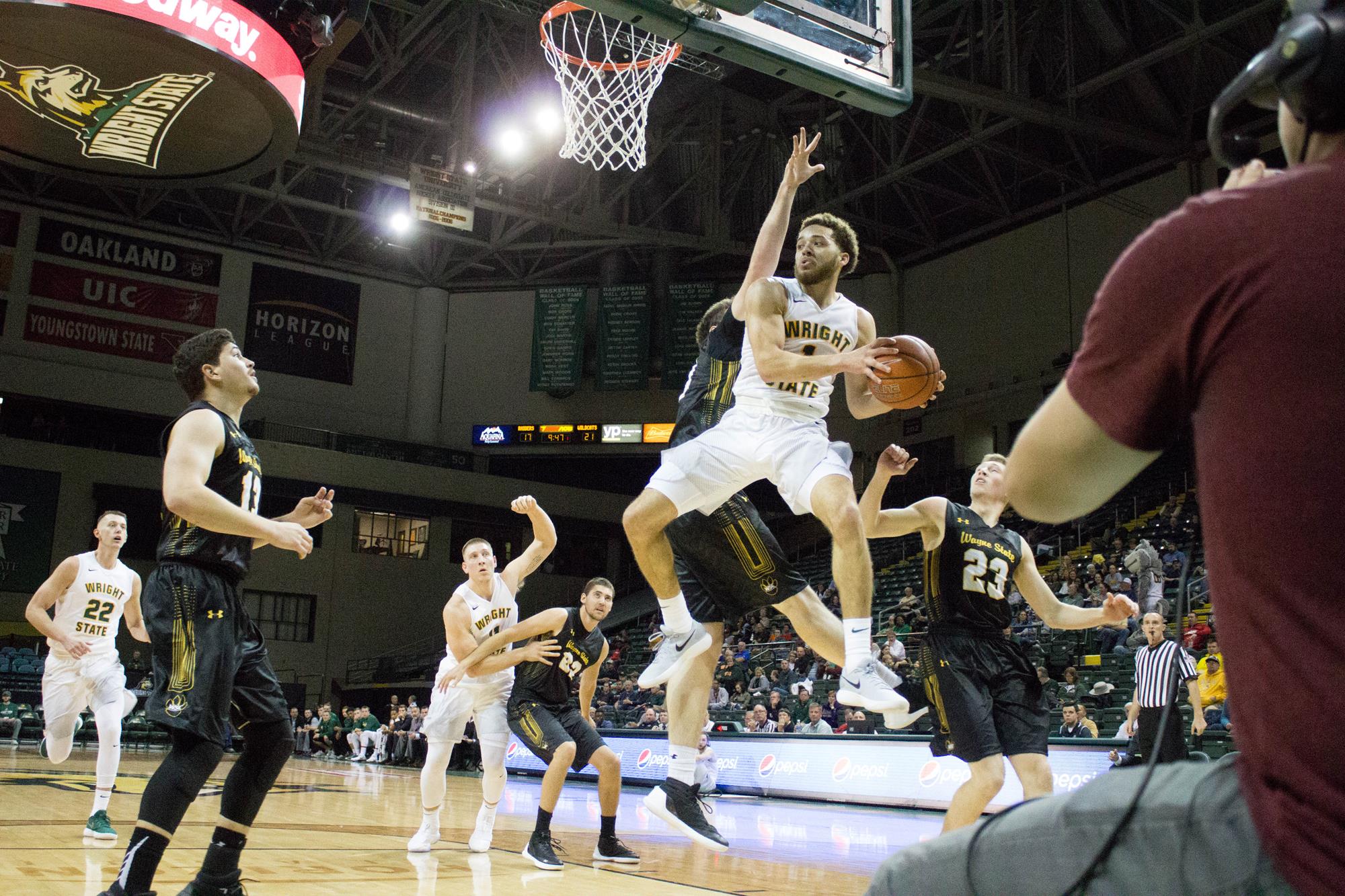 A Wright State Raider drives against Wayne State at the Nutter Center